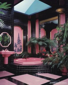 the bathroom is decorated in pink and black with palm trees on the wall behind the bathtub