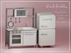 a play kitchen with refrigerator and microwave next to each other on a pink background that says pride