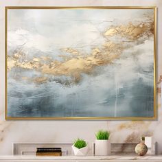 an abstract painting hangs on the wall above a fireplace