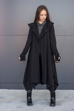 ➤ Features Length: front - 105 cm, back - 120 cm Open front cut cardigan type Long sleeves Bare back Oversized layered hoodie Flared Removable belt Pockets on the sides ● The model is 5'6″ (168cm) tall ● The model is a S ➤ Sizing SIZE CHART (cm/inch) XS-bust 85/33.5, waist 66/26, hips 91/35.8 S-bust 90/35.5, waist 71/28, hips 97/38 M-bust 95/37.4, waist 76/30, hips 102/40 L-bust 102/40, waist 83/32.7, hips 109/43 XL-bust 109/43, waist 90/35.5, hips 116/45.5 2XL-bust 116/45.5, waist 97/38, hips 1 Alternative Black Outerwear With Pockets, Gothic Outerwear For Halloween, Black Emo Outerwear For Alternative Fashion, Oversized Gothic Outerwear For Fall, Oversized Black Gothic Outerwear, Gothic Fall Outerwear, Black Emo Outerwear For Fall, Emo Black Outerwear For Halloween, Halloween Emo Black Outerwear