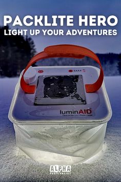 an ad for the lumin aid pack in the snow with text reading,'package hero light up your adventures '