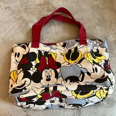 Disney Minnie Mouse Canvas Tote Bag Disney Minnie Mouse White Bag, White Disney Bags For Everyday Use, White Disney Everyday Bag, Minnie Mouse Multicolor Travel Bags, Disney Style White Everyday Bags, White Disney Style Bag, Multicolor Disney Bag With Mickey Mouse Design, Cute Mickey Mouse Bags For Disney Trips, White Mickey Mouse Bag For Disney Fan Events