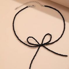 Black Beaded Bow Neckless. Clasp In Back Trendy Black Beaded Necklaces For Party, Trendy Black Beaded Necklace For Party, Trendy Black Beads Necklace For Party, Trendy Beaded Necklaces For Summer Parties, Trendy Summer Beaded Necklaces For Parties, Trendy Summer Party Beaded Necklaces, Elegant Summer Party Beaded Necklaces, Edgy Necklace, Beaded Bow