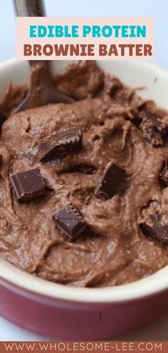 a bowl filled with brownie batter and chocolate chunks