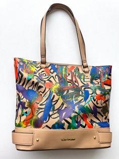 Luxury Designer Tote Bag Abstract Design with bright contrasting colors! Top handle with gold accent hardware Faux leather material.  Measurements: 13.5 inches height 13- 14 inches width 5 inches depth 10 inch drop This artistic hand-painted handbag will be a great addition to your handbag collection! Affordable Handbags, Painted Handbag, Handbags Luxury, Handbag Collection, Handbags Affordable, Handbag Women, Top Handle Handbags, Women's Handbags, Gold Accent