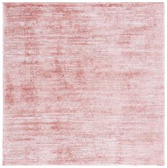 an area rug with pink and white colors