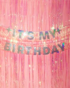 it's my birthday streamers with stars and sparkles hanging from the ceiling