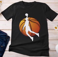 Basketball shirt. Basketball lovers shirt. Sports lovers shirt. Basketball fans shirt. Basketball player shirt. Basketball supporters shirt. Basketball shirt for men. Basketball women shirt.  Basketball cool design. Suitable outfit for women, men, girls, boys, basketball lovers, basketball player on holiday, birthday.  🌟 Welcome to SOUQUSA4U! We're excited to bring you premium, ethically crafted cotton T-shirts designed for both comfort and style. Every shirt is made with care and attention to detail, tailored just for you. 📏 PRODUCT INFORMATION & SIZING: Please refer to the Size chart in the images above to find your perfect fit. 🛒 HOW TO PLACE YOUR ORDER: Choose your preferred T-shirt size and color. Select the quantity you want. Click "Add to Cart." For multiple items, simply return Black Short Sleeve T-shirt For Basketball, Sporty Sublimation Print Shirt For Sports, Sporty Sublimation Print Shirt For Sports Events, Sporty Shirt With Sublimation Print For Sports Season, Sporty Shirt With Sublimation Print For Sports Events, Basketball T-shirt With Sublimation Print, Sports Fan Apparel Shirt With Sublimation Print, Black T-shirt For Basketball Season, Basketball Team Spirit Short Sleeve Tops