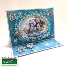 a christmas card with snowflakes and a teddy bear on a sleigh