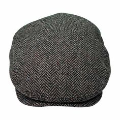 a gray and black hat with a herring pattern on the front, sitting against a white background