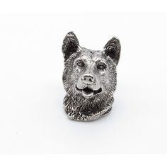 a close up of a dog's head on a white background