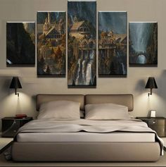 a bedroom with three paintings on the wall and a large bed in front of it