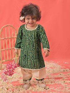 VASTRAMAY SISHU Girls Green Bandhni Print Kurta And Patiala Set Brighten up your little one's wardrobe with the VASTRAMAY SISHU Girls Green Bandhni Print Kurta And Patiala Set. This set combines traditional design with modern comfort, making it perfect for festive occasions and casual wear. Features Beautiful Bandhni print Comfortable fit Easy to wear and remove Perfect for festive occasions Specifications Set includes: 1 Kurta and 1 Patiala Color: Green Sizes available: 4-10 years Material & Ca Green Dupatta With Dori Work, Festive Bandhani Print Sets With Long Sleeves, Traditional Green Sets With Bandhani Print, Green Traditional Set With Bandhani Print, Traditional Green Bandhani Print Sets, Festive Cotton Choli With Gota Work, Green Cotton Gota Work Set, Cotton Choli With Gota Work For Navratri, Green Bandhani Print Sets For Festivals