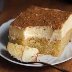 a piece of cake sitting on top of a white plate