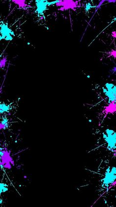 a black background with blue and pink paint splatters