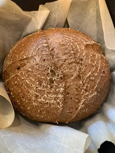 a loaf of bread sitting on top of a piece of paper