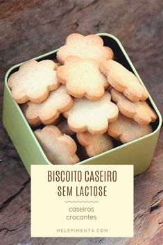 some cookies in a green box on a wooden table with the words biscoito cassero sem lactosee