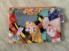 This is a Zipper pouch, made from 100% cotton and fully lined with zipper. It is perfect Gift for your mom and friend. It can be used as a cosmetic bag, coin pouch, card holder, earphone pouch, medicine pouch, stocking stuffer, travel purse, zipper pouch, make up pouch, credit card wallet, ... Fun Multicolor Pencil Case For Gift, Fun Multicolor Pencil Case Gift, Fun Multicolor Bags For Personal Use, Multicolor Pouch Cosmetic Bag As Gift, Multicolor Cosmetic Bag Suitable As Gift, Multicolor Cosmetic Bag As Gift, Multicolor Cosmetic Bag Perfect For Gifts, Multicolor Bag With Zipper Closure For Gifts, Orange Zipper Pouch For Gift