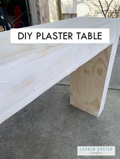 a wooden table with the words diy plaster table on it's side