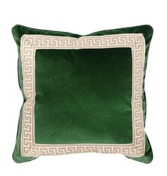 a green and white pillow with an greek border on the front, sitting against a white background