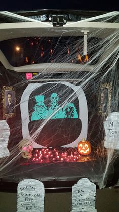 the back of a car decorated with halloween decorations