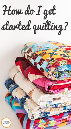 a stack of quilts with the words how do i get started quilting?