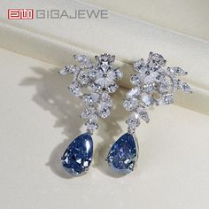 Brand:GIGAJEWE® Product Name:GIGAJEWE Total 29.5ct 925 silver plated gold Earrings Natural Blue and white Pear Cut Push Back Moissanite Earrings ,Wedding gift Main Stone Material:Moissainte Stone  Shape:Pear Cut Color:Natural Blue and white Color  Stone Weight:10*16mm pear cut Total:29.5ct Customization:Can select different kinds of gemstone for customization Blue Cubic Zirconia Diamond Earrings For Wedding, Wedding Sapphire Drop Diamond Earrings, Sapphire Earrings For Wedding In Diamond White, Exquisite Sapphire Wedding Earrings, Blue Diamond Earrings For Wedding, Fine Jewelry, Blue Diamond Earrings With Prong Setting For Wedding, White Gold Sapphire Diamond Earrings For Wedding, Elegant Sapphire Earrings For Wedding, Wedding Diamond Earrings In White Gold With Sapphire