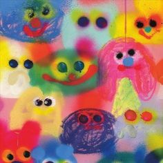 an abstract painting with many different colored faces