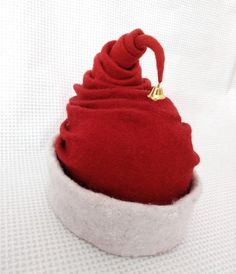 • Unusual felt Santa cap with a bell will decorate and give incredible emotions on special days. This wool hat carries the magic of Christmas, with which it envelops you and your loved ones.Santa's hat can also be a great gift for family and friends.It can be made in any color you like, so you can add an accessory in the form of brooches, colors and others. You can also make hats for dwarves, elves and other mystical creatures. Immerse yourself in the world of fairy tales and magic, Santa's hat Red Winter Hat As A Gift, Red Winter Hats For Gifts, Red Mini Hat For Winter Gift, Red Felt Party Hat For Winter, Winter Mini Cap Hats As Gifts, Winter Mini Felt Hats With Short Brim, Winter Mini Hats With Short Brim, Winter Mini Hats With Short Brim In Felt, Red Christmas Hat For Festive Occasions