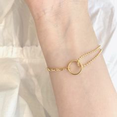 18k Gold Plated Mix Chain Choker Bracelet with Hoop Detail Polished Gold will give just the right glimmer of gold for your everyday look Dainty, Boho and easy layered with your other pieces.  Clasp Closure for easy access Bracelet is adjustable from 15 - 19 cm ♡ ABOUT US ♡ GOLD VIBES ONLY We make semi-precious jewelry that looks and feels like expensive solid gold pieces without the hefty solid gold price tags. A thick plating of 18k Gold allows all of our pieces to look just like fine jewelry a Adjustable Gold Plated Dainty Chain Bracelet, Gold Minimalist Chain Bracelet With Simple Design, Minimalist Gold Chain Bracelet With Simple Design, Minimalist Gold-tone Chain Bracelet, Minimalist Yellow Gold Resizable Bracelets, Minimalist Resizable Yellow Gold Bracelets, Dainty Resizable Chain Bracelet For Everyday, Minimalist Gold Resizable Chain Bracelet, Dainty Gold Plated Round Chain Bracelet