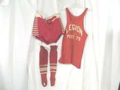 Fun find - OLD basketball uniform with tank top and shorts. Logo on front is Legion Post 79, number on the back is 0. Faded red heavyweight cotton or lightweight wool, felt letters. Condition good , some pilling inside, very light storage odor. Shorts have dye run on the white areas. Have red and white inserts down the sides, feel like nylon. No size tag, look pretty small. Padded sides Circa thirties 40's . Authentic vintage athletic gear. Top Chest 32" - 36" Hem circumference 36" - 38" Length 30" Shorts Waist 30" Hips 40" Leg opening 25" Waist to leg top 11.5" Old Basketball, Shorts Logo, Sports Numbers, Tank Top And Shorts, Vintage Sport, Felt Letters, Basketball Uniforms, Athletic Gear, Sports Uniforms