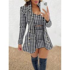 -Item Id 28519304.Html?Mallcode=1&Zeedropid=1629363 -Color: Black And White -Style: Elegant -Pattern Type: Houndstooth -Details: Button, Pocket, Button Front -Outerwear Sleeve Length: Long Sleeve -Neckline: Shawl Collar -Outerwear Length: Regular -Top Type: Camisole -Bottom Type: Skirt -Outerwear Material: Knitted Fabric -Outerwear Composition: 100% Polyester -Temperature: Spring/Fall (18-25/63-77) -Outerwear Body: Unlined -Sleeve Type: Regular Sleeve -Fit Type: Regular Fit -Fabric: Slight Stret Fitted Houndstooth Blazer For Spring, Spring Fitted Houndstooth Blazer, Trendy Fitted Blazer With Houndstooth Pattern, Trendy Fitted Houndstooth Blazer, Fitted White Houndstooth Blazer, Trendy Houndstooth Pattern Blazer, White Houndstooth Blazer In Chic Style, Black Houndstooth Blazer For Spring, Crop Top Skirt Set