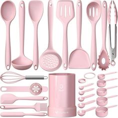 the kitchen utensils are all pink in color