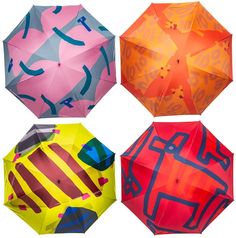 four different colored umbrellas with designs on them