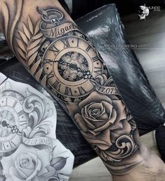 a man's arm with a clock and roses tattoo on the forearm, in black and grey