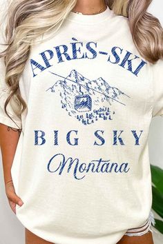 APRES SKI BIG SKY MONTANA OVERSIZED GRAPHIC TEEPREMIUM COTTONOVERSIZED FIT Trendy Graphic Print Tops For Outdoor Activities, Casual Skiing Tops, Casual Graphic Print Top For Skiing, Casual Winter Skiing Tops, White Crew Neck Top For Snowboarding, Crew Neck Tops For Ski Season, White T-shirt For Outdoor Winter Activities, White Tops With Text Print For Outdoor Activities, Big Sky Montana