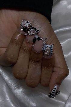 a woman's hand with two different designs on it