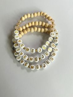 Based on the well known hymn "Give Me Jesus" (African American Spiritual). Handmade bracelet, made durably, and will fit an average adult wrist size of 6.5-6.75 inches. This bracelet is handmade with a combination of natural blonde wood, gold,  and either opaque light pink, opaque white, or steely blue faceted glass beads. Please choose your color of choice when checking out! FREE SHIPPING Inspirational Handmade Name Bracelet For Everyday, Everyday Inspirational Handmade Name Bracelet, Inspirational Handmade Name Bracelet, Inspirational Handmade Stretch Bracelet, Handmade Inspirational Stretch Bracelet As Gift, Handmade Inspirational Stretch Bracelet Gift, Inspirational Handmade Stretch Bracelet As Gift, Inspirational Handmade Bracelets For Everyday, Inspirational Handmade Stretch Bracelet Gift