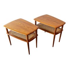 pair of mid - century teak side tables with caned sides by unknown age