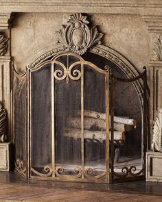 an ornate fireplace screen is shown in this image