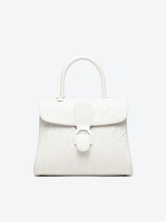 Luxury leather handbags | Delvaux Official Website | US Snowy Mountain, Winter Getaway, Luxury Purses, Airport Fashion, Quilting Techniques, Galeries Lafayette, Clean Cut, Airport Style, Accessories For Men