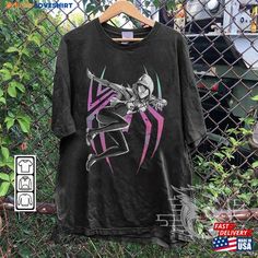 Spider Gwen Movie Shirt K1 Spiderman 2023 Across The Verse Sweatshirt T-Shirt Classic Check more at https://musicloveshirt.com/product/spider-gwen-movie-shirt-k1-spiderman-2023-across-the-verse-sweatshirt-t-shirt-classic/ Marvrl T Shirts, Spiderman Theme Shirts, Mary Jane Spiderman Shirt, Marvel College Shirt, Spiderman T Shirt Vintage, Vinyl Spiderman Shirt, Spiderman Nyc Shirt, Miles Morales Movie, Spiderman Shirt