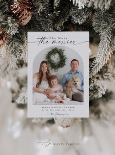 an ornament hanging on a christmas tree with a photo of the couple and their baby