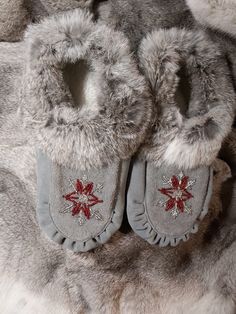 Authentic Handmade Moccasins, Made with Cow Hide leather and white rabbit fur, lined with imitation sherpa Winter Slip-on Slippers With Faux Fur Trim, Flat Slippers With Faux Fur Lining For Winter, Winter Flat Slippers With Faux Fur Lining, Comfortable Slip-on Winter Moccasins, Winter Suede Moccasins With Round Toe, Gray Round Toe Winter Slippers, Comfortable Winter Slip-on Moccasins, Handmade Moccasins, Cow Hide