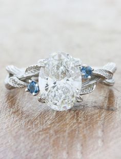 caption:2.50ct oval diamond w/ aquamarine accents Bark Texture, Handcrafted Engagement Ring, Nature Inspired Engagement Ring, Blue Green Sapphires, Unique Diamond Engagement Rings, Aquamarine Engagement Ring, Yellow Gold Setting, Unique Diamonds, Stone Engagement