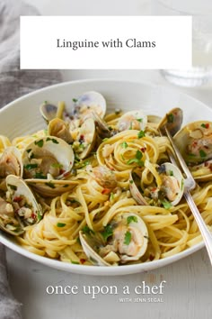 linguini with clams in a white bowl