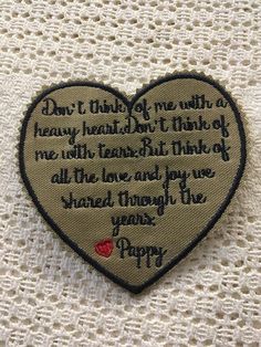 a heart - shaped patch with the words, don't trust me until i am happy about it