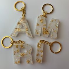 the letters are made out of acrylic paint and gold glitters on them