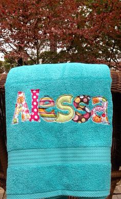 a blue towel with the word mesa on it