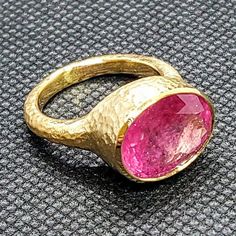 14k solid yellow gold hammered ring with 6.82 ct. 14x11 mm oval shape natural pink tourmaline. This item can also be ordered in white or rose gold with different color gemstones such as, amethyst, pink amethyst, green amethyst, blue topaz, London blue topaz, white topaz, citrine, garnet, smoky quartz, peridot, aquamarine & morganite, please contact me for a quote as each gemstone varies in price. I am a manufacturer of fine jewelry for over thirty years, loyalty & customer satisfaction h Handmade Pink Oval Ruby Ring, Handmade Oval Ruby Ring In Yellow Gold, Handmade 14k Gold Oval Ruby Ring, Handmade Oval Ruby Ring In 14k Gold, Dancing Diamond, Celebrity Engagement Rings, Hammered Ring, Hammered Rings, Pink Amethyst